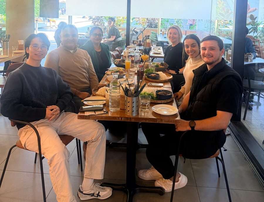 The Hubshift team gathered around a table